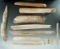 Group of assorted bone artifacts found in the Dakotas, largest is 6 1/8