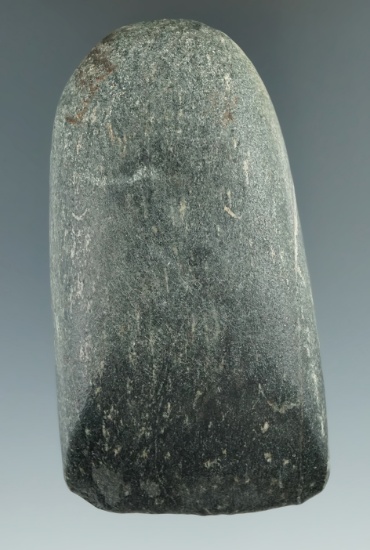 3 5/8" hardstone Celt with excellent use wear to the bit area found in Michigan.