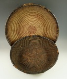 Pair of African moving Baskets, largest is 14