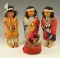 Set of four vintage Skookum dolls, largest is 6 1/2