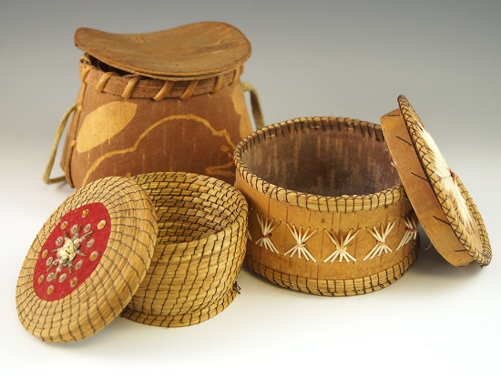 Set of three baskets, one from bark, one from pine needles and one with quill work.