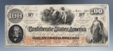 100 Dollar Confederate Note- Nov. 24, 1862 (with tax interest stamp).