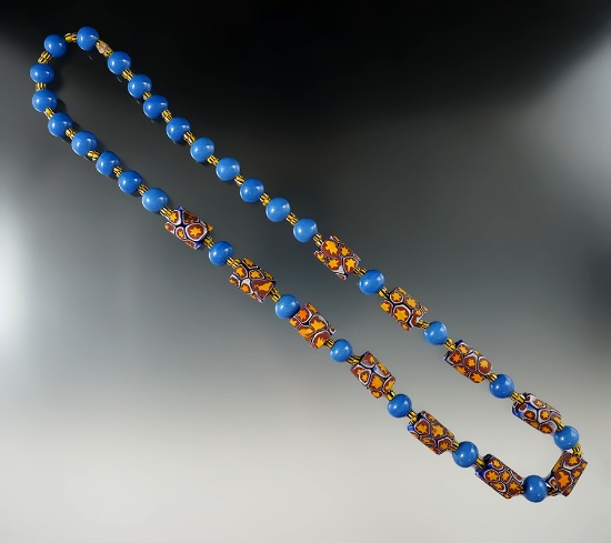 24" Long strand of assorted colorful beads from various time periods.