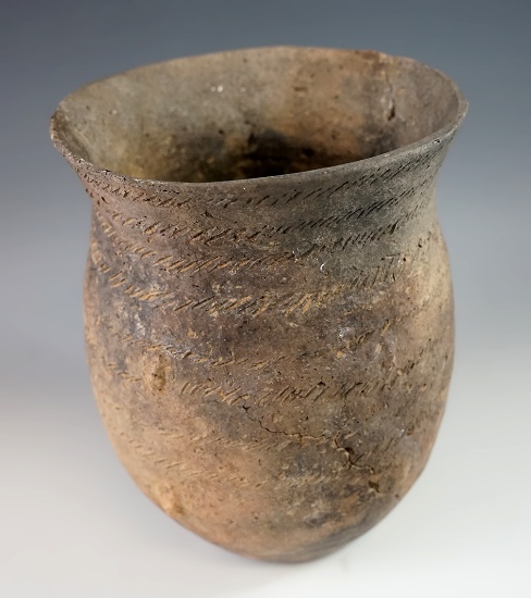 Large 7 1/4" tall Caddo Punctate Jar with some repair found in Clark Co., Arkansas.