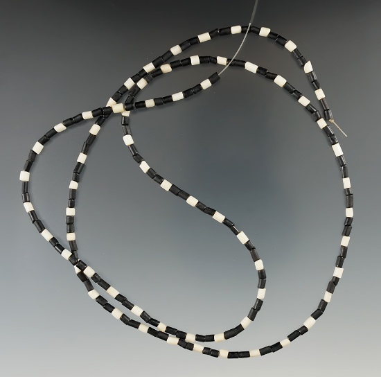29" strand of black-and-white tube beads found in New York.  Mickey Taylor "Iron Horse" collection.