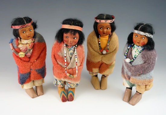 Set of four Skookum Dolls in nice condition, all are around 7" tall.