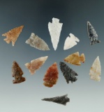 Group of 12 attractive Plains arrowheads made from various materials. Largest is 1 1/16