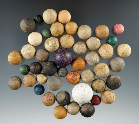 Nice group of old clay and stone marbles.