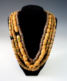 Four strands of Sandcast trade Beads, longest strand is 32