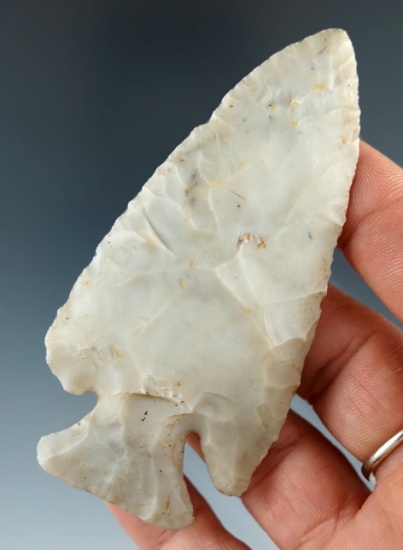 3 3/8" Archaic Deep Notch Bevel. Flint Ridge Chalcedony. One ear was worked off in ancient times.