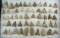 Group of approximately 53 mostly quartz triangular arrowheads found in New Jersey.