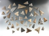 Group of 42 triangle points found along the Genesee River near Belfast, Allegheny Co., New York.