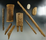 Group of assorted bone artifacts in various conditions found in Alaska. Largest is 12