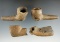 Four Iroquois pipes with some damage and some restoration. Largest is 3 1/8