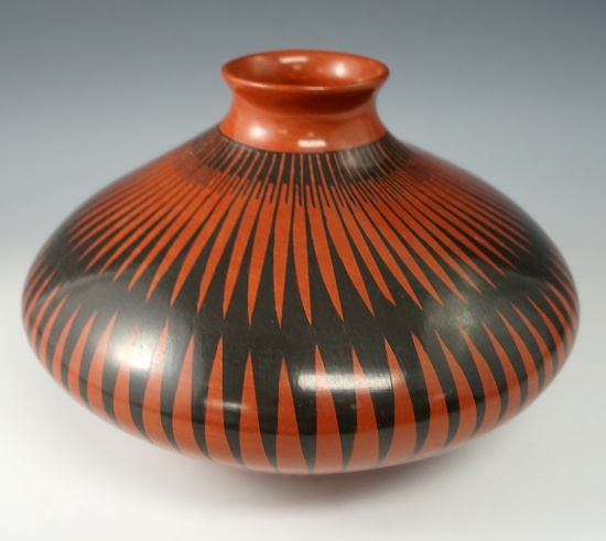 Beautifully decorated 6 1/2" wide contemporary pottery vessel signed by artist "Julio Ledezma".