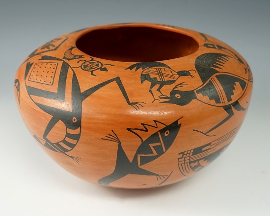 Beautiful artwork on this 6 3/4" wide contemporary Southwestern pottery vessel.