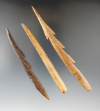 Set of three Inuit bone harpoons, one is broken near the base, largest is 5 5/8