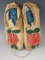 Pair of old doeskin floral design beaded moccasins that are 8 3/4