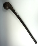 Nicely styled carved wood club with excellent patina.