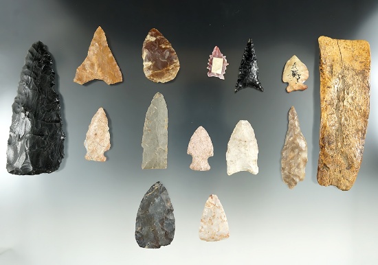 Group of assorted artifacts in various locations. Largest is 4 5/8".