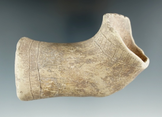 3 5/8" engraved woodland period pottery pipe found in Tennessee. Some ancient damage to rim.