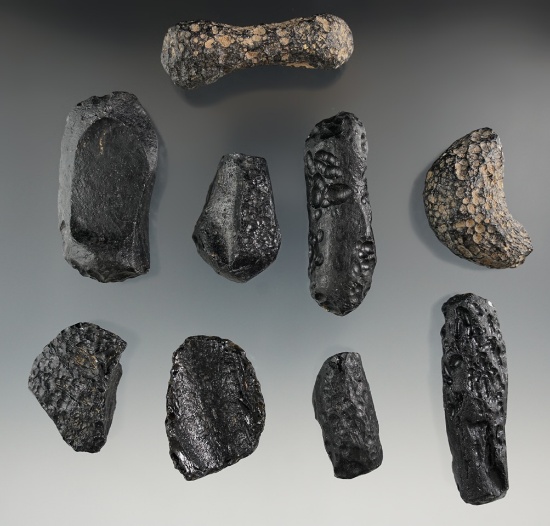 Group of nine Tektites found at the Khorat Plateau, Northeast Thailand in 1964. Ex.  Dwight Wolfe.