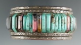 Vintage  Southwestern jewelry:  wrist cuff with beautiful stone inlays that measures 2 3/4