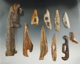 Group of 10 assorted bone and ivory Inuit artifacts, largest is 5 3/4