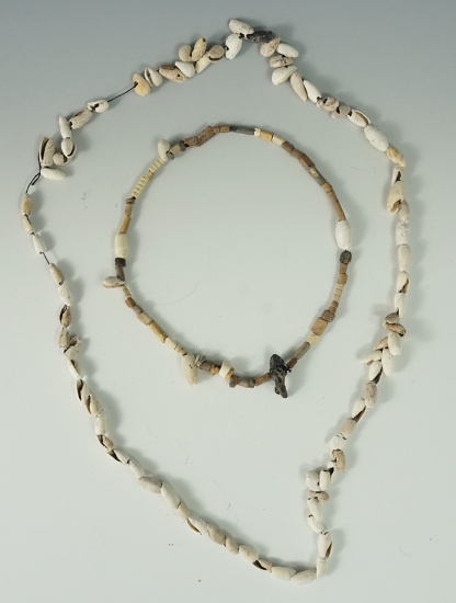 Pair of shell and stone bead necklaces. Largest is a 24" strand. The smaller necklace is a 13" stran