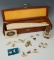 Group of assorted contemporary carvings and jewelry from Alaska.