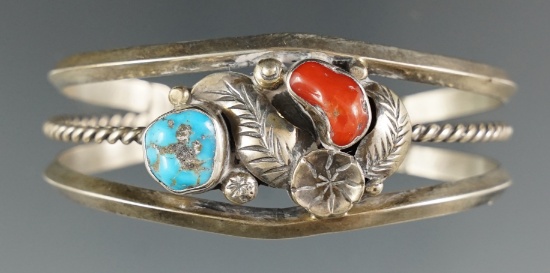 Contemporary Southwestern bracelet that is 2 5/8" wide.