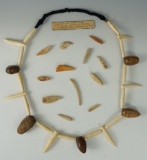 Large necklace and an assortment of tools from Alaska.