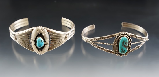Pair of silver and turquoise cufflinks, one is stamped sterling.