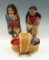 Pair of Skookum dolls plus a nicely crafted Skookum baby in a cradle. Largest all measures 6 3/4