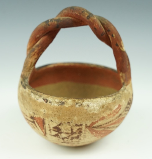 3 5/8" by 5" tall Southwestern pottery basket. Some wear on exterior, no breaks/restoration.