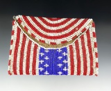 Beautifully beaded red white and blue leather vintage purse that measures 4 3/4