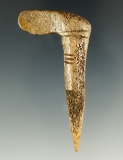 Very uniquely styled Bone Perforator/Awl with incised line design. Found at Sauvies Island, OR.