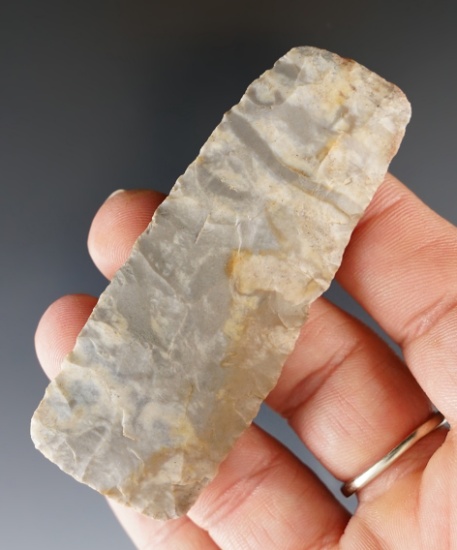 Very fine 2 7/8" Paleo Square Knife found in the Midwest. Outstanding flaking and colorful flint.
