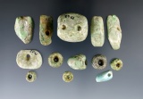 Set of 13 attractive drilled pre-Columbian beads found in Mexico. Largest is 1