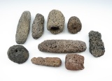 Set of nine lava stone artifacts found in New Mexico, largest is 4