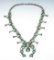 Beautifully crafted turquoise and silver squash blossom vintage Southwestern necklace.
