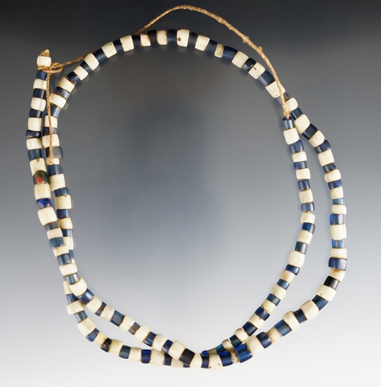25" Strand of blue and white trade beads found in New York.