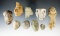 Set of nine assorted pre-Columbian stone and clay artifacts found in Mesoamerica.