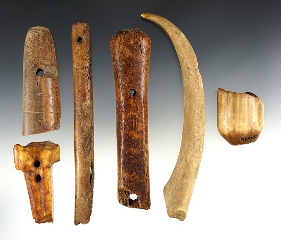 Set of six assorted antler, bone and ivory Inuit artifacts found in Alaska. Largest is 6 7/8".