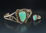 Pair of vintage turquoise and silver Southwestern jewelry items including a wrist bracelet & a ring.