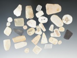 Group of 34 undrilled stone and shell beads and pendants found at a site in New Mexico.