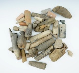 Large group of assorted clay artifact sections, mostly pipes, found at various sites in New Mexico.