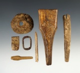 Set of seven assorted ivory and bone Inuit artifacts found in Alaska. Largest is 4
