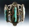 Large and ornate turquoise and silver Wrist Cuff.