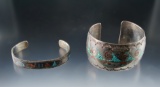 Pair of Wrist Cuffs; the smaller is stamped sterling, the larger (stamped J.L.).